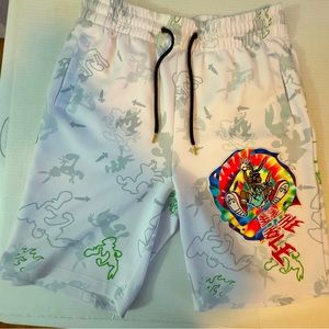 Fat Guap Shorts, Size Medium. Down the rabbit hole patch on front.